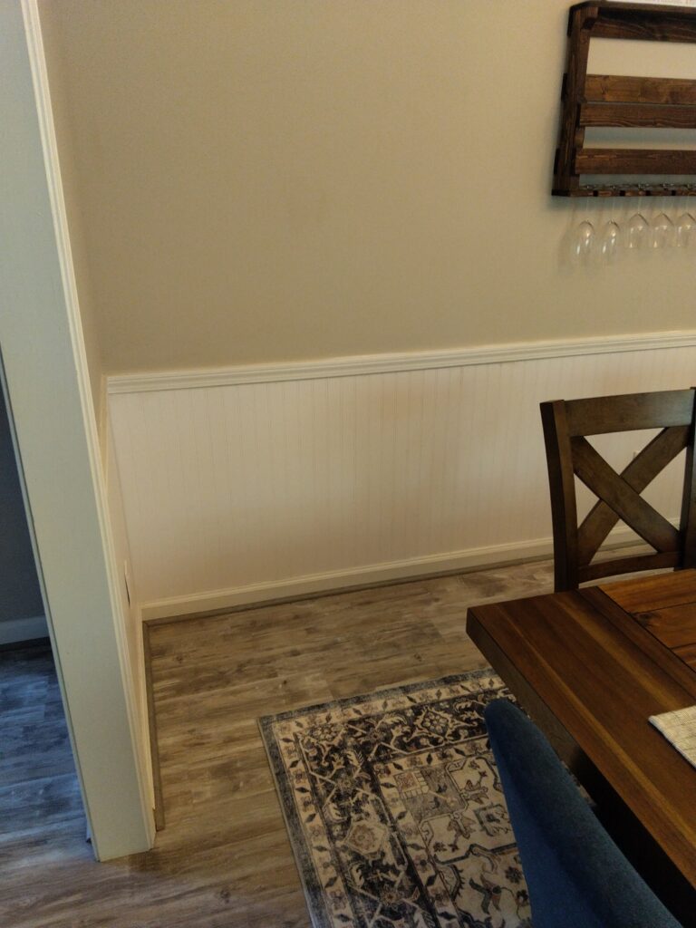 Finished wainscoting really adds to the dining room.