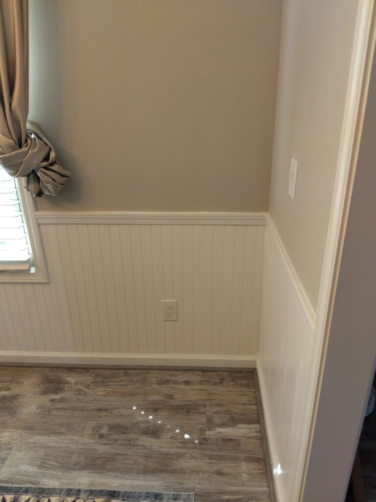 Finished wainscoting really adds to the dining room.