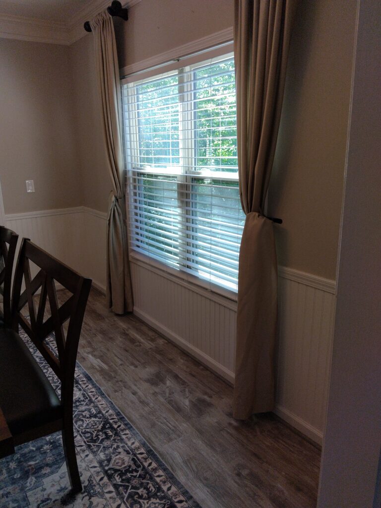 Finished wainscoting really adds to the dining room.