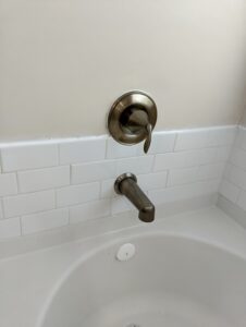 Bathtub tile surround after removing the missteps and doing a proper fix.