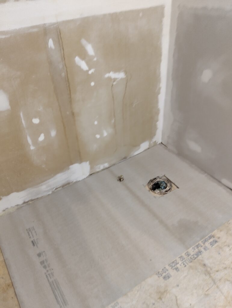 Cement board down!