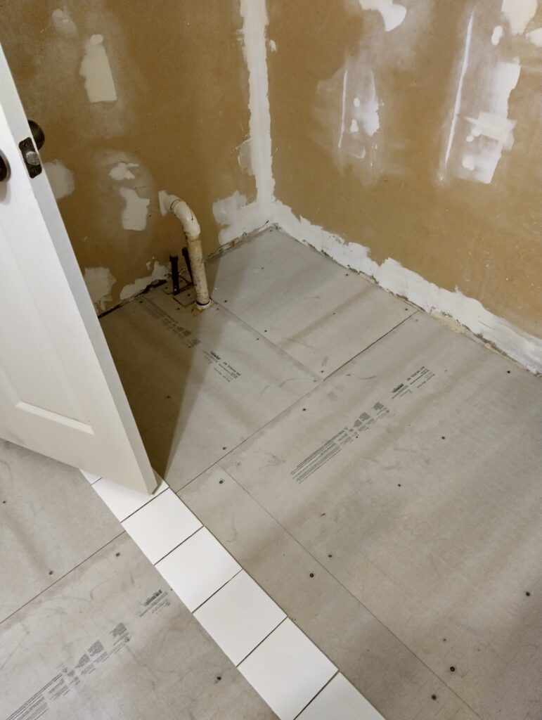 Cement board down!