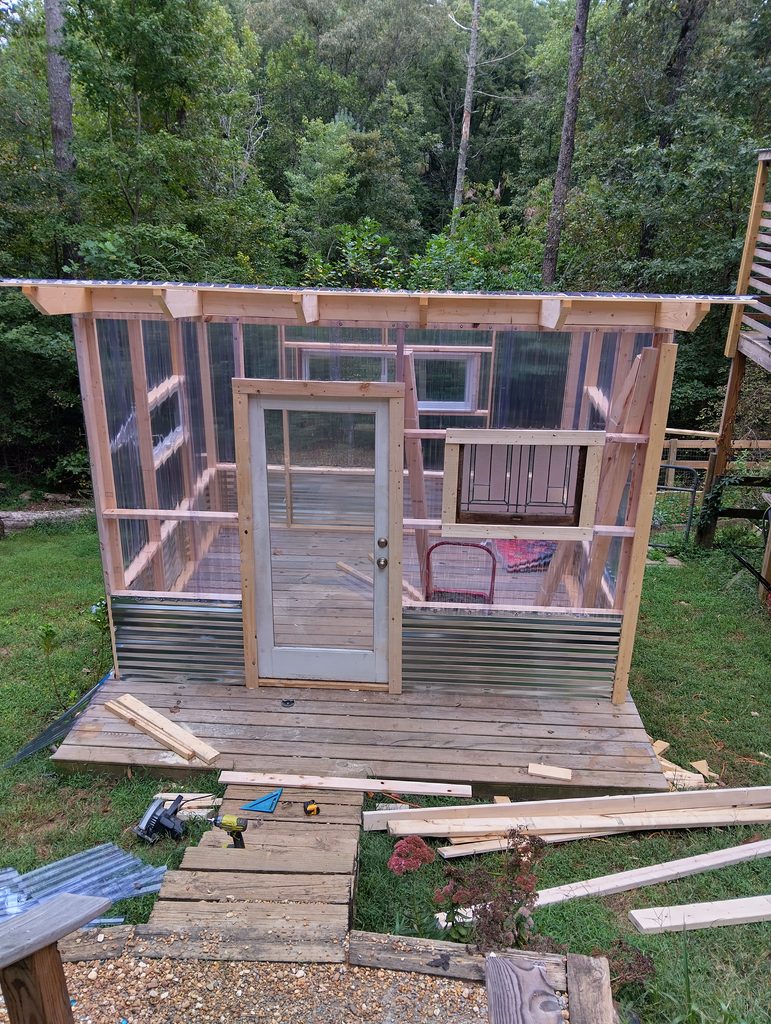 The door is in! adding some 1x4 trim to the whole thing.